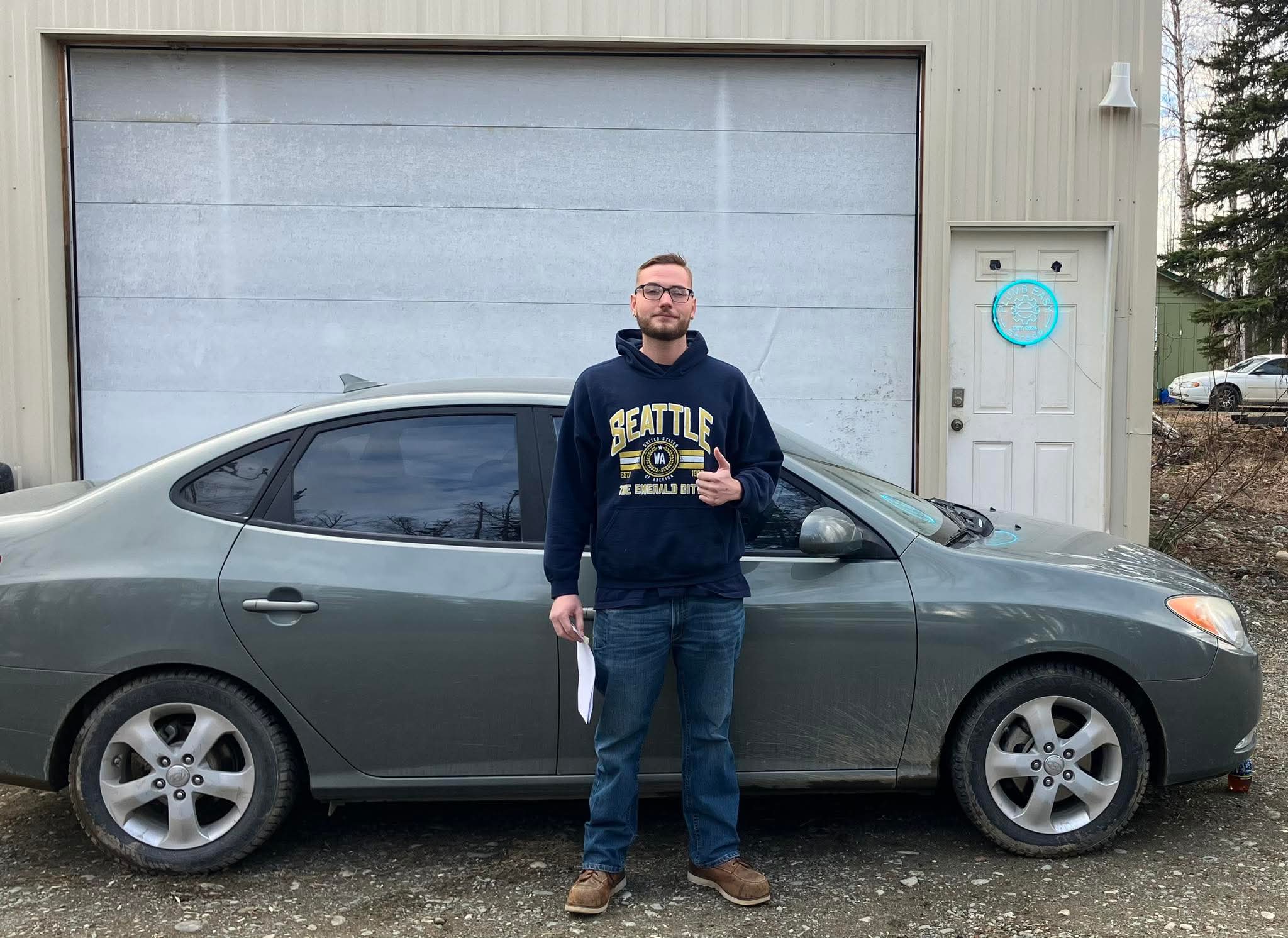 Happy customer picking up a vehicle 9