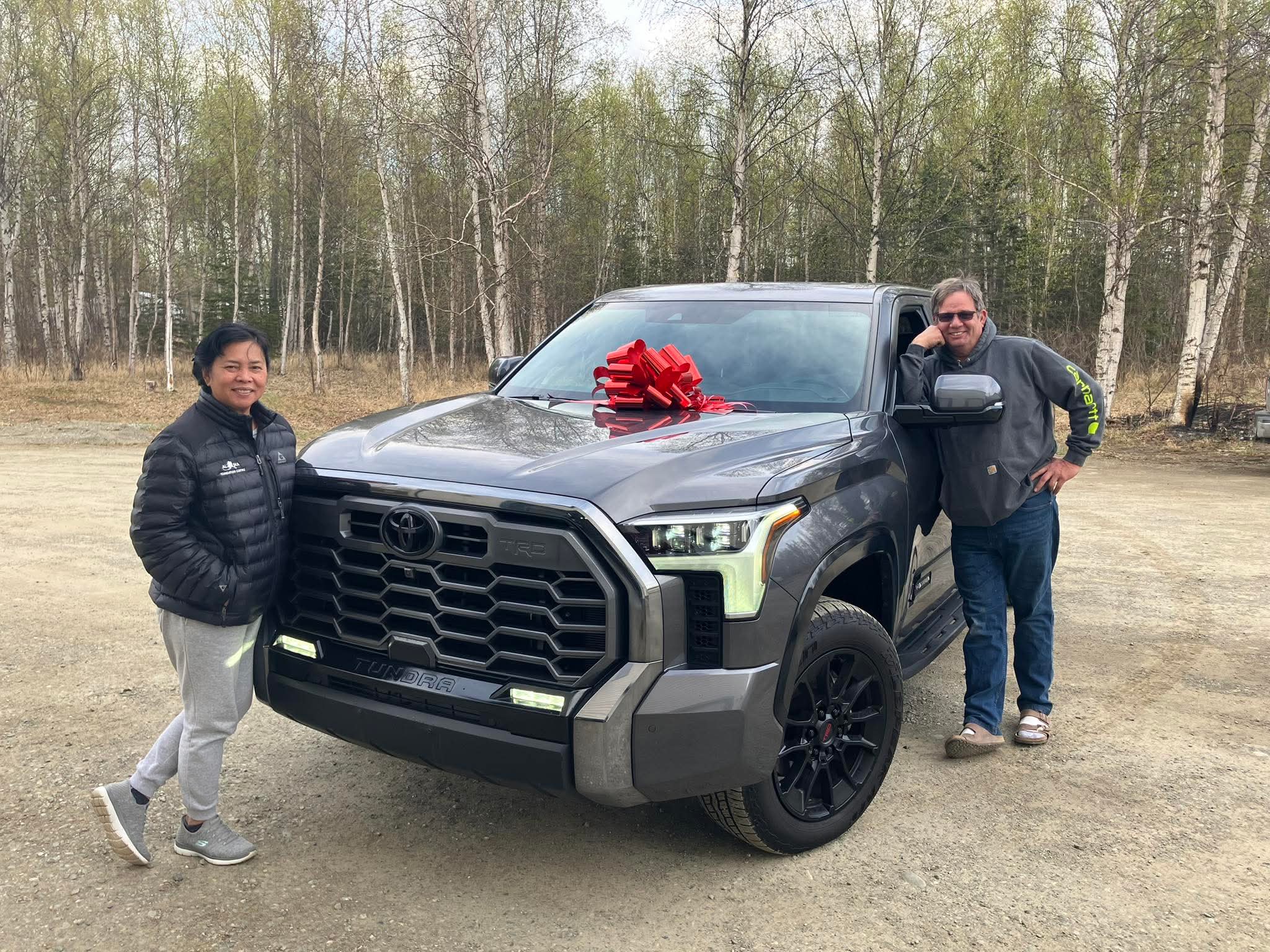 Happy customer picking up a vehicle 11