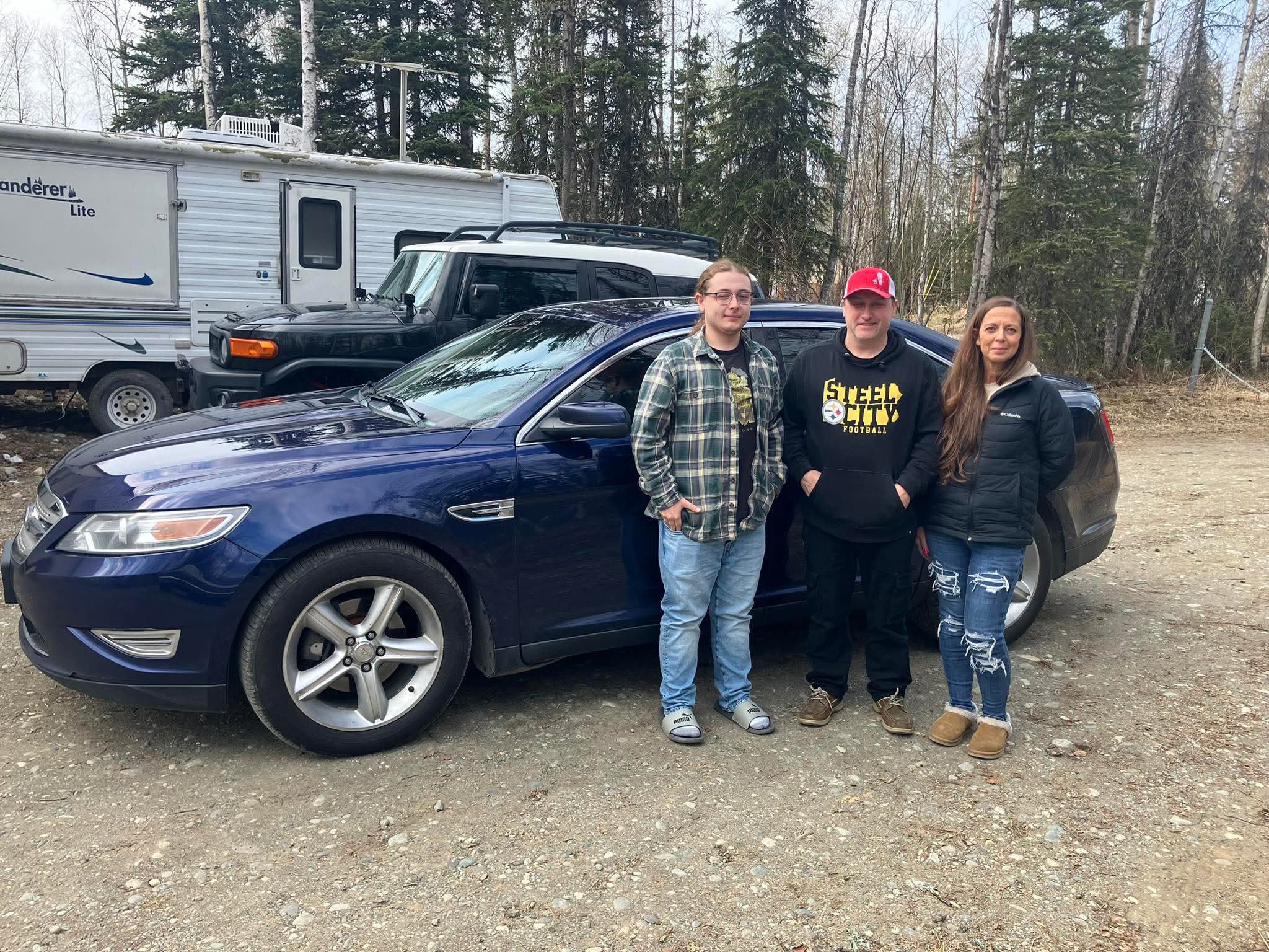 Happy customer picking up a vehicle 13