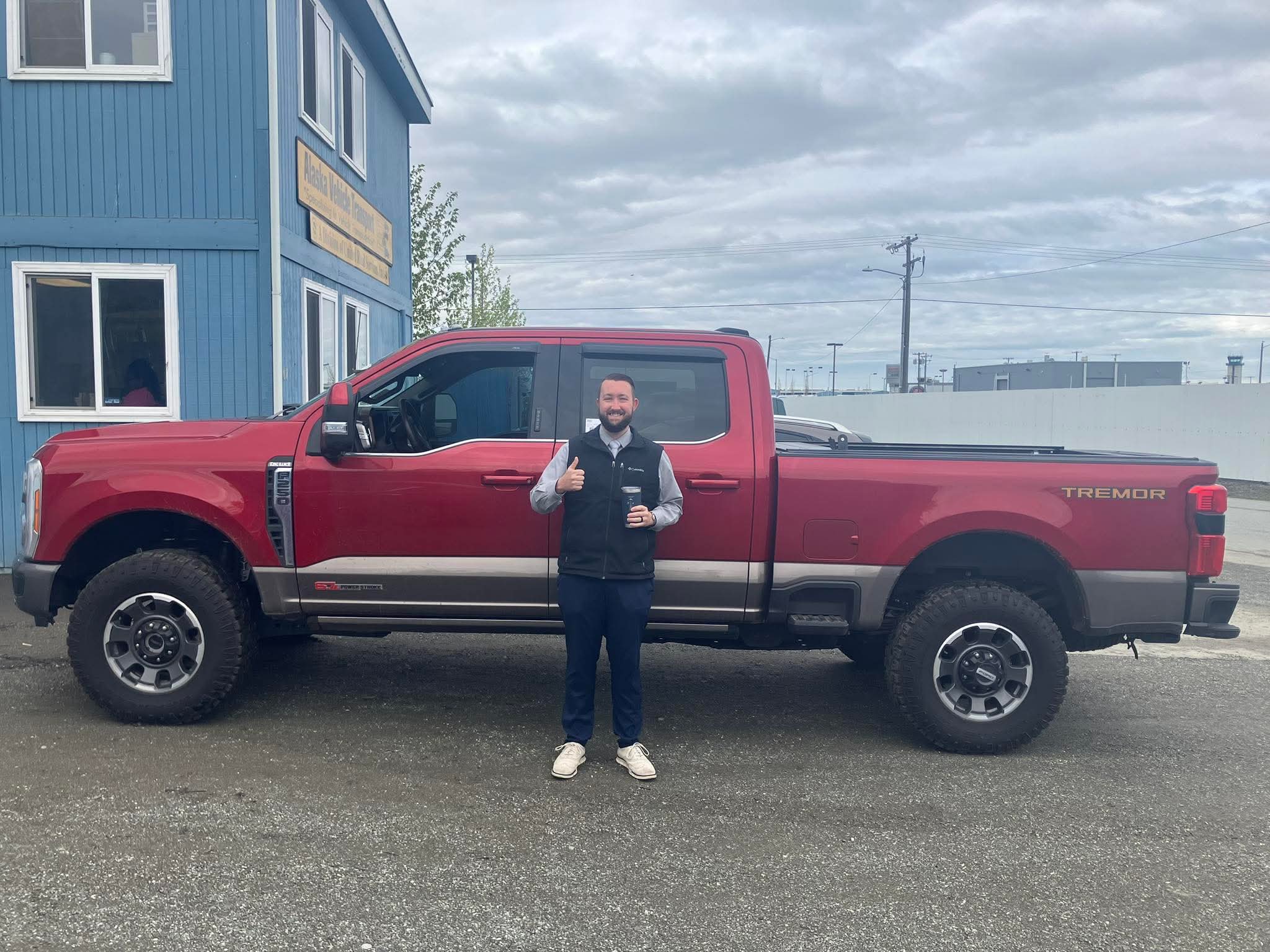 Happy customer picking up a vehicle 14