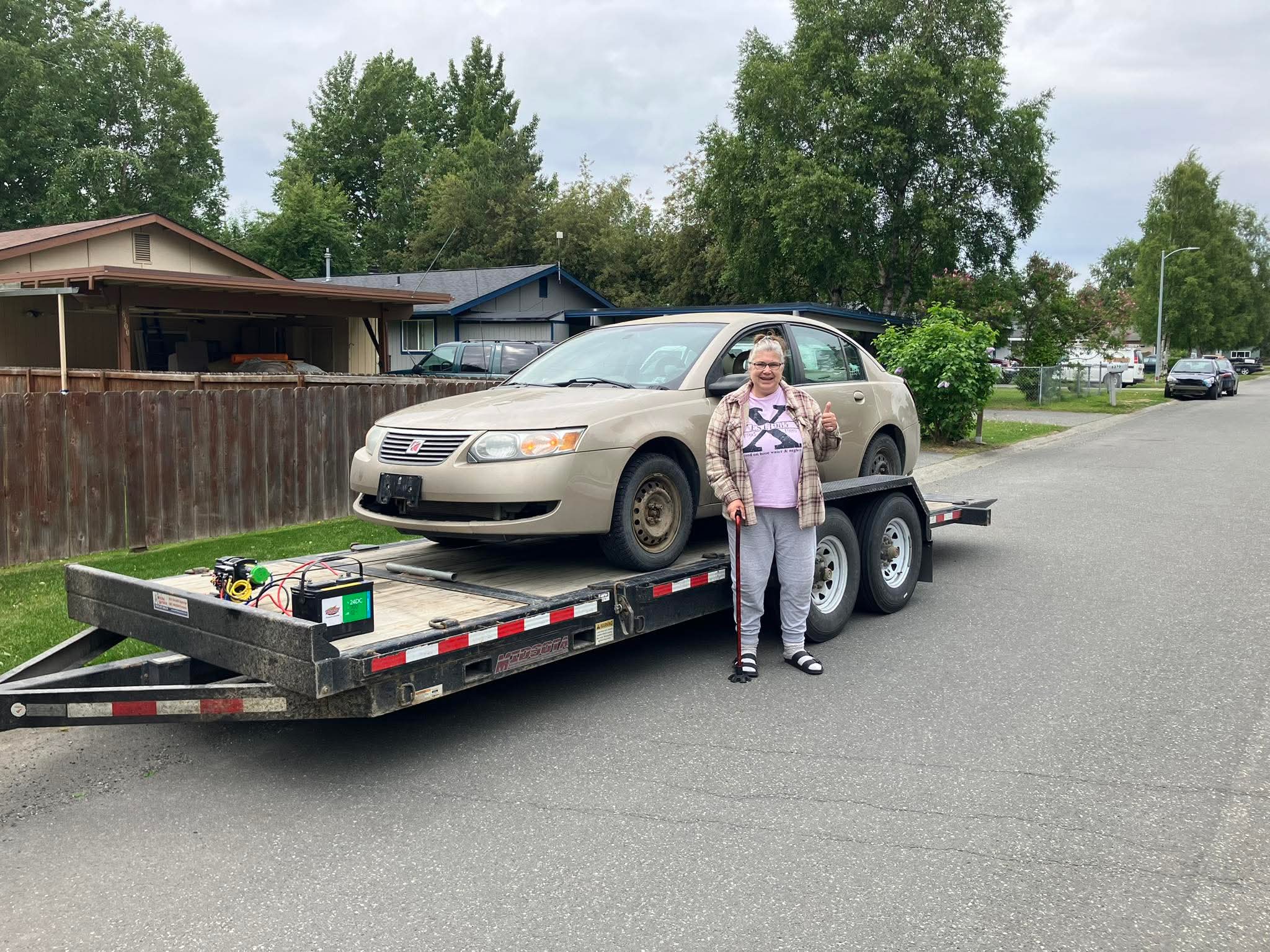 Happy customer picking up a vehicle 16
