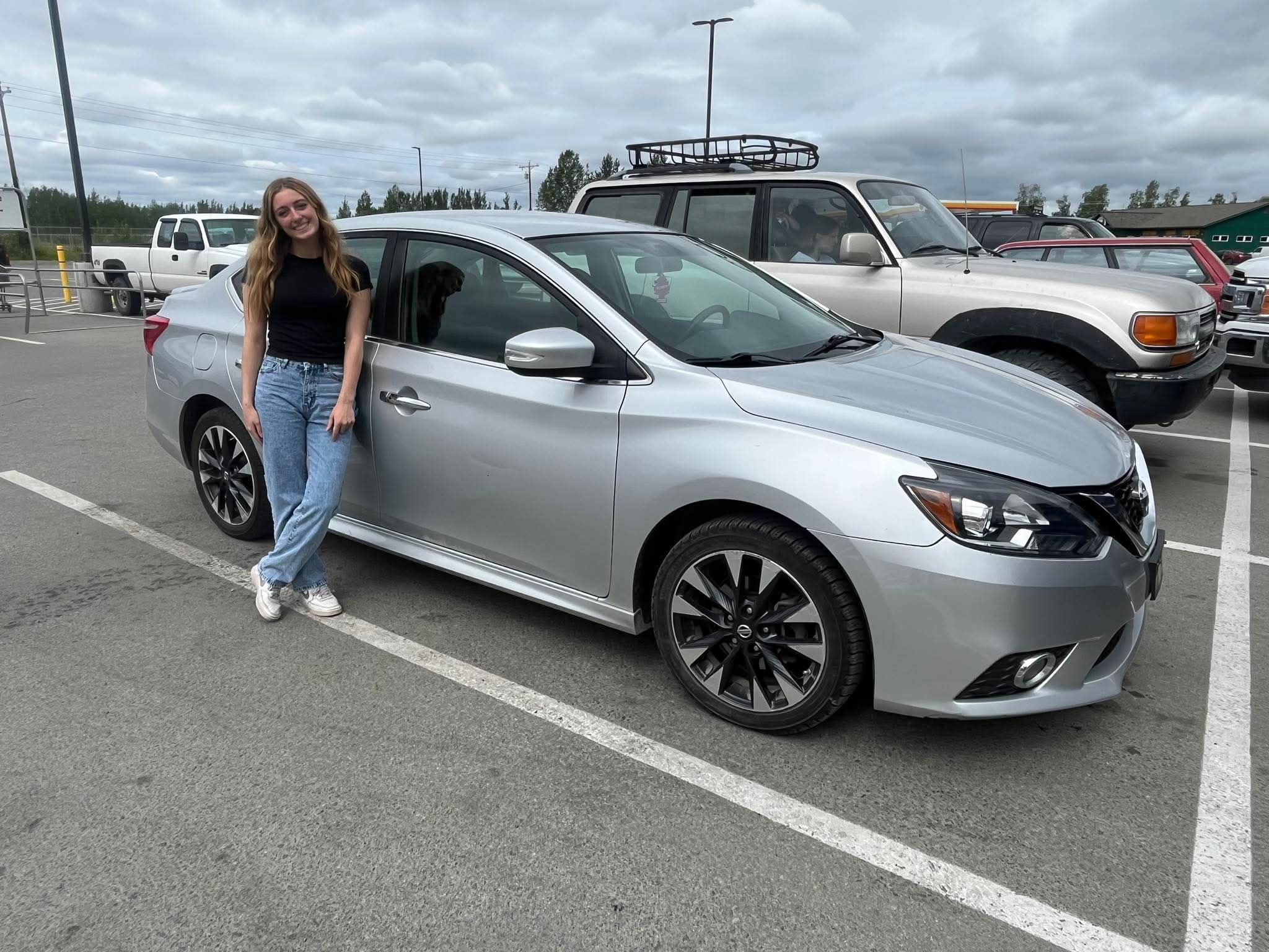 Happy customer picking up a vehicle 19